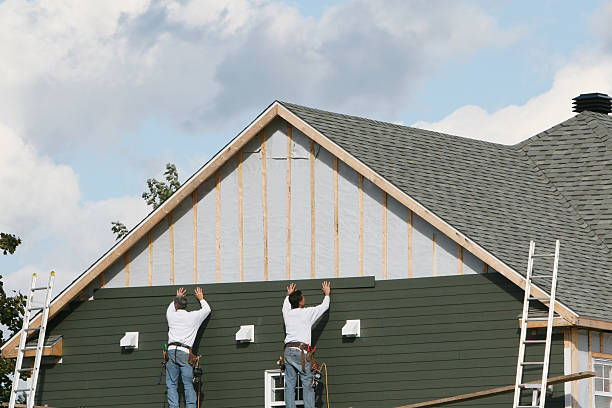 Professional Siding technician working in Mount Holly, NC